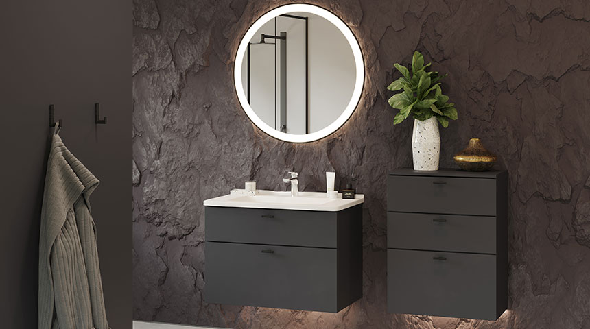 Bamboo handles and hooks in black and brass in a modern bathroom